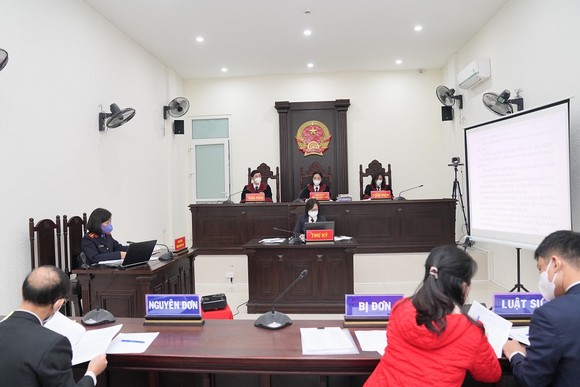 Hình ảnh phiên tòa xét xử trực tuyến được truyền trực tiếp tới 30 quận, huyện tại Hà Nội ảnh 3