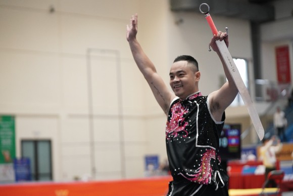 VĐV Wushu Việt Nam "bay" trên chiến thắng ảnh 18