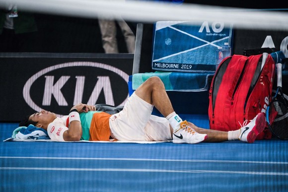 Australian Open 2019: Nishikori bỏ cuộc, Djokovic nhẹ nhàng vào bán kết ảnh 1