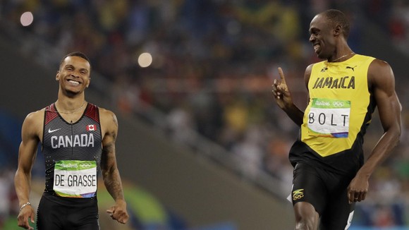 “Bại tướng của Usain Bolt” Andre de Grasse xưng hùng ở cự ly 200m, tuyển Mỹ bị loại ở cự ly tiếp sức 4x100m ảnh 2