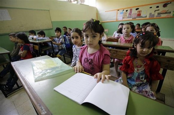 Học sinh tại một trường học ở Tripoli (Libya). Ảnh: AFP/TTXVN