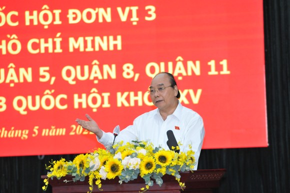 Chủ tịch nước Nguyễn Xuân Phúc: TPHCM đi đầu trong phục hồi kinh tế - xã hội sau dịch ảnh 2