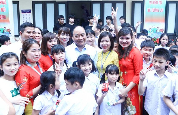 Chủ tịch nước Nguyễn Xuân Phúc: Chăm sóc trẻ em khuyết tật hòa nhập cộng đồng ảnh 1