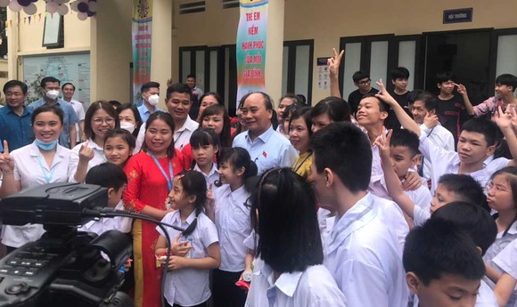 Chủ tịch nước Nguyễn Xuân Phúc: Chăm sóc trẻ em khuyết tật hòa nhập cộng đồng ảnh 4