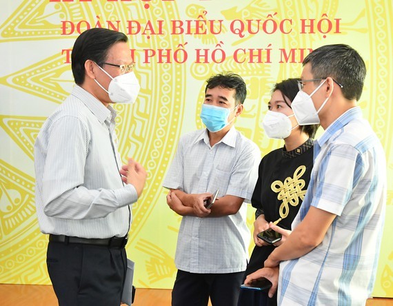 HCMC to announce its level of Covid-19: Chairman ảnh 1
