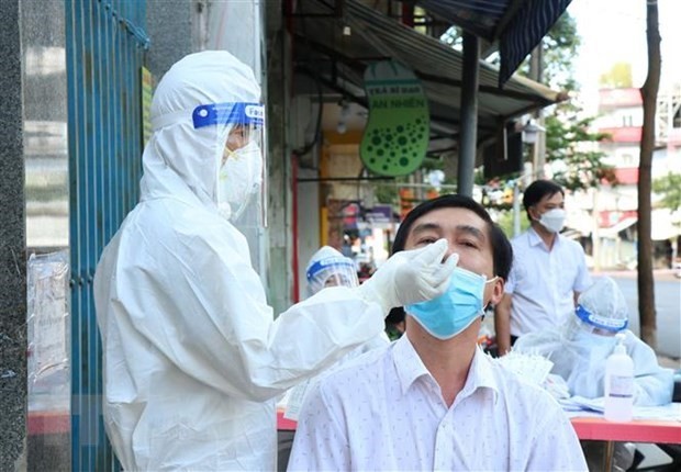Vietnam reports 13,109 new Covid-19 cases on Nov. 26 ảnh 1