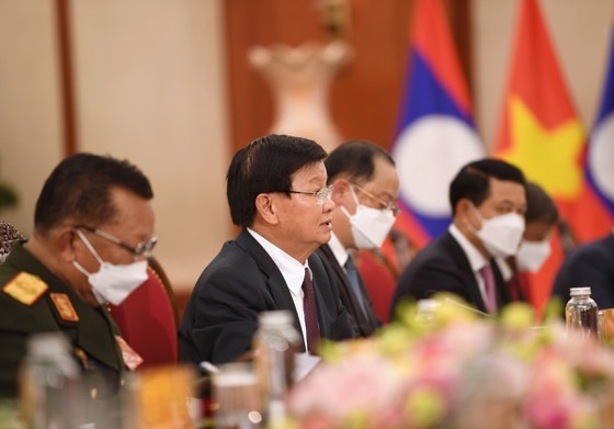 Party, State leader of Laos visits Vietnam ảnh 8
