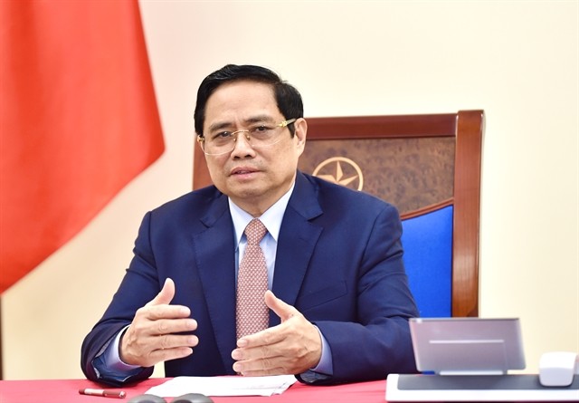 PM Pham Minh Chinh holds phone talks with Indian counterpart ảnh 1