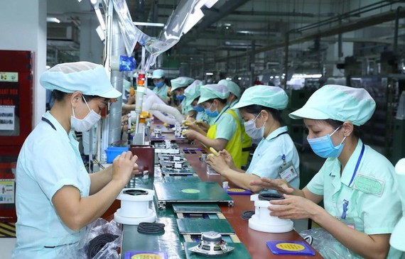 FDI capital hits US$14 billion despite Covid-19 ảnh 1