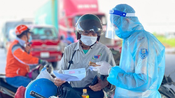 HCMC: not require negative Covid-19 test declaration for essential travel ảnh 1