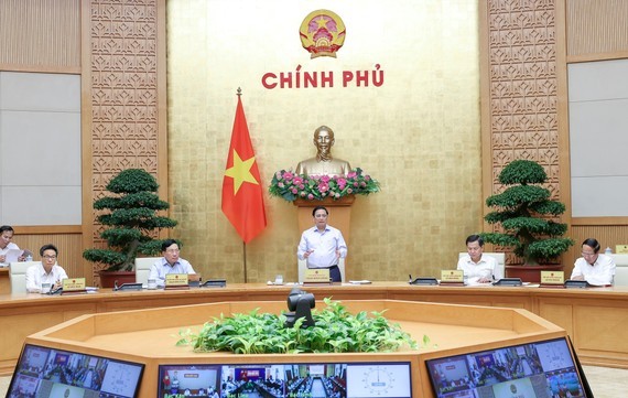 PM asks ministry to solve new passport model-related problems ảnh 1