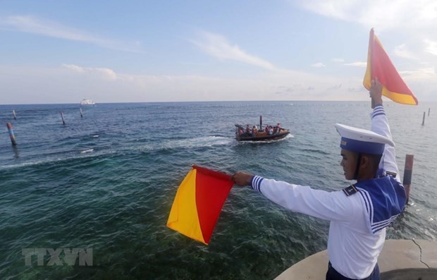 Vietnam resolutely rejects China’s unilateral fishing ban: Deputy Spokesman ảnh 1