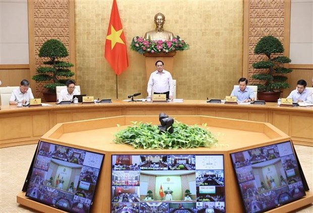 PM urges greater efforts to achieve best possible results for 2022 ảnh 1