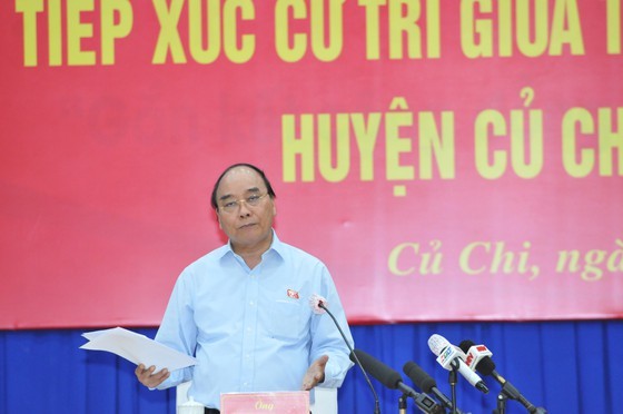 President Nguyen Xuan Phuc: Not to let development make people impoverished ảnh 1