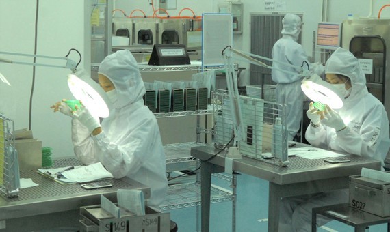 Foreign investment flow pumped heavily into Vietnam ảnh 1