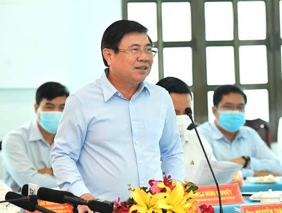 State President holds working session with Cu Chi, Hoc Mon districts in HCMC ảnh 7