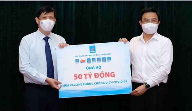 COVID-19 vaccine fund raises VND185 billion ảnh 1