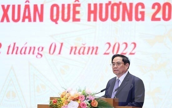 PM meets OVs joining “Xuan Que huong” program ảnh 1